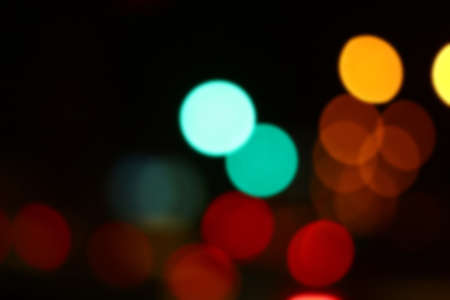 Blurred of car in city at nightの写真素材