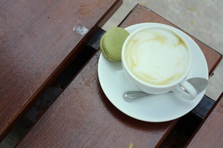 Green tea and milk with macaroon