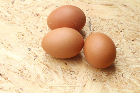 eggs in a bowl on the tableの写真素材