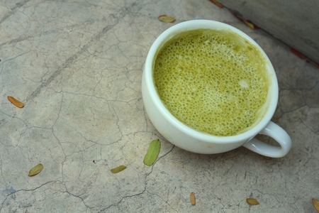 Matcha green tea latte beverage in glassの写真素材