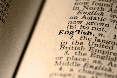 The word English. Close-up of the word English in a dictionary.