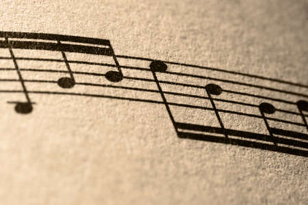 Notes of Music. Close-up detail of several musical notes printed on a piece of sheet music.の写真素材