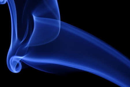 Blue Smoke 11. Abstract curves of blue smoke on a black background.の写真素材