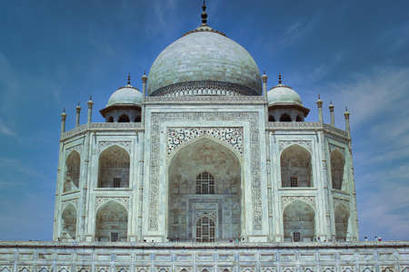 Agra, India - May 12, 2012: Close up shot of sharply focused Taj mahal monument (a symbol of love) against dramatic blue skyのeditorial素材
