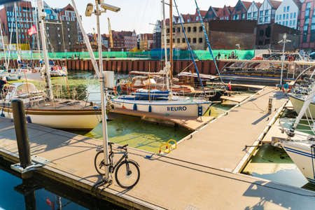 Gdansk, North Poland - August 13, 2020: Bike parked in a port bay of ship yard near baltic sea