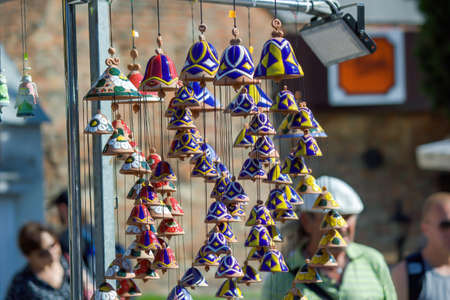 Gdansk, North Poland - August 14, 2020: Close up shot of a colorful bells for decoration being sold in the old town of city center as souvenir during dominic's fair in Augustのeditorial素材
