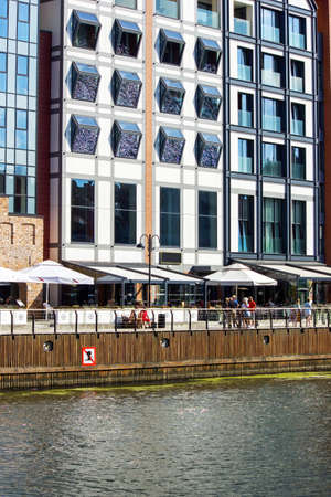 Gdansk, North Poland - August 14, 2020: Building exterior and restaurant located in the porch over...