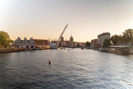 Gdansk, North Poland - August 15, 2020: Polish architecture over motlawa river during sunsetのeditorial素材