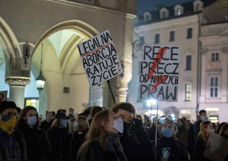 Krakow, Poland - October 24, 2020: People in masks during corona virus pandemic have nationwide strike in order to demonstrate a huge protest against a legislative proposal for a total ban of abortionのeditorial素材