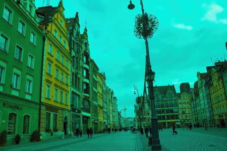 Wroclaw, Poland: December 29, 2017: Polish architecture in the main city center against dramatic...