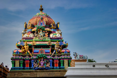 Chennai, India - October 27, 2018: Exterior of Arulmigu Kapaleeswarar Temple an ancient Hindu architecture temple located in South India. Hindu place of worship, A tomb designed with god sculptureのeditorial素材
