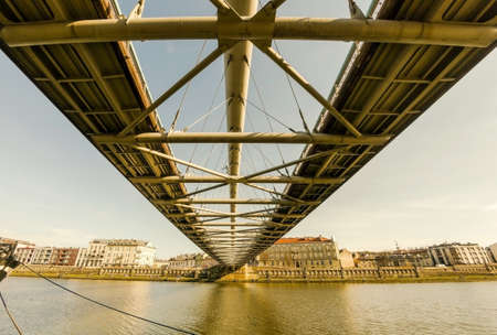 A Wide angle of a man made metal modern architecture of a bridge located over vistula river in the...