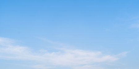 blue sky with beautiful natural white clouds background textureの写真素材