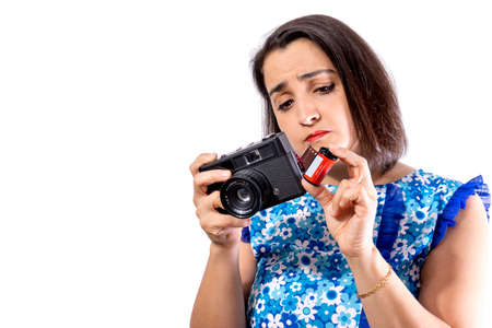 Woman With Retro Camera In Studio