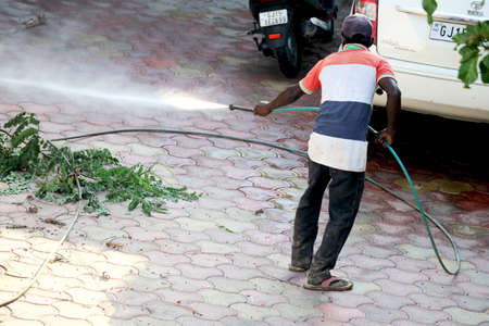 City Valsad, state Gujarat, country-India 03/05/2020 government is sanitizing area during covid-19 pandemicのeditorial素材