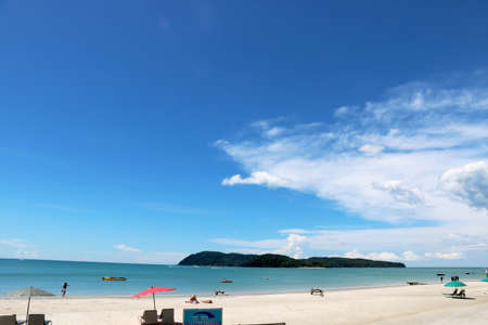 Country- Malaysia city - langkawi date - 07/09/2020 landscape view of pantai cenang beach at Langkawi Island with tourist attraction and background of blue sky and hillsのeditorial素材