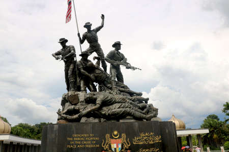 Country- Malaysia, City- Kuala lumpur, Date 07/30/2020 soldiers sculpture at national monument in kuala lumpurのeditorial素材