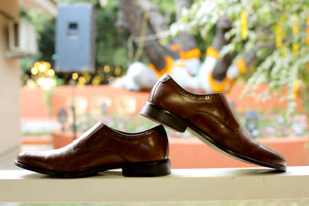 portrait view of pair of leather casual shoesの写真素材