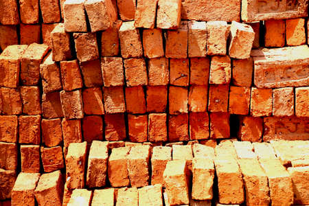 Stack of red bricks for construction purposeの写真素材