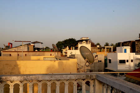 City-valsad, State- Gujarat, country- India Date- 10/10/2020 city view with small house and old apartment from top of terraceのeditorial素材