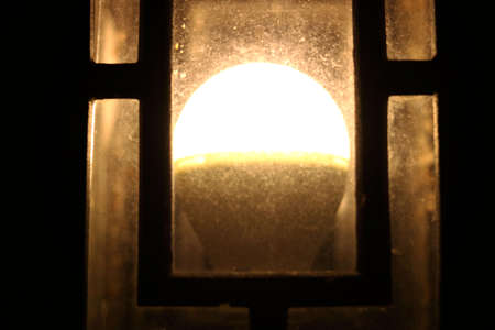 Outdoor design glowing lamp on Dark Backgroundの写真素材