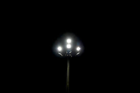 halogen lamp glowing on poleの写真素材