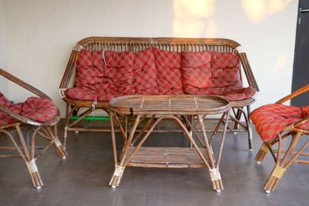 Old vintage handmade Bamboo Sofa, table and chairの写真素材