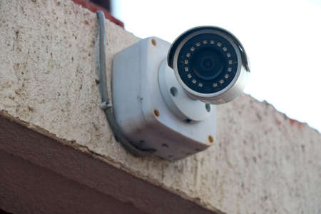 image of closed-circuit television installed on wallの写真素材