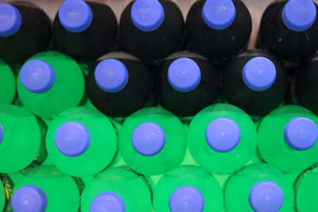 view of cold drink bottle's kept in fridge verticallyの写真素材