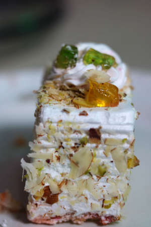White creamy dry fruit and nuts pastry cakeの写真素材