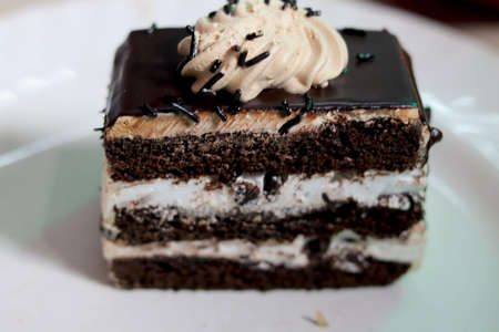 portrait view of chocolate pastry cakeの写真素材