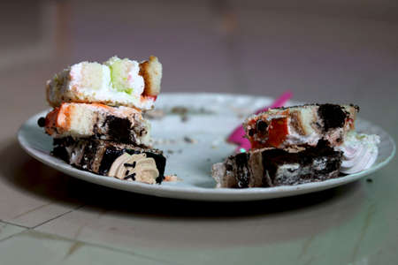 portrait view of Different flavor pastry cake in plateの写真素材