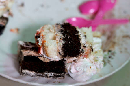 portrait view of Different flavor pastry cake in plateの写真素材