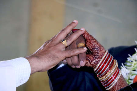 Indian bride & Groom exchange Engagement ringの写真素材