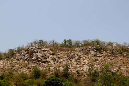 Image of small hill with big big rockの写真素材