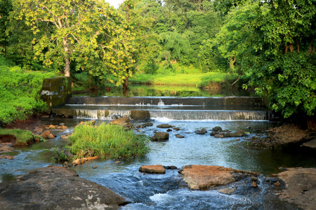 diversion dam taking water from river with backgroundの写真素材