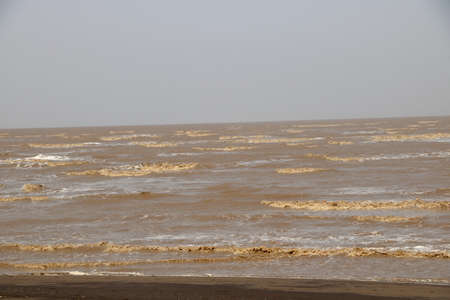 View of water tide on Indian beachの写真素材