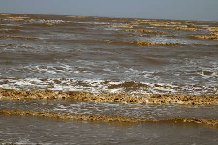 View of water tide on Indian beachの写真素材