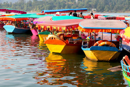 colorful boats park at river bank of at dudhni- Gujarat- Indiaの写真素材