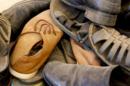 mountain of shoes never use during lock down with dust on topの写真素材