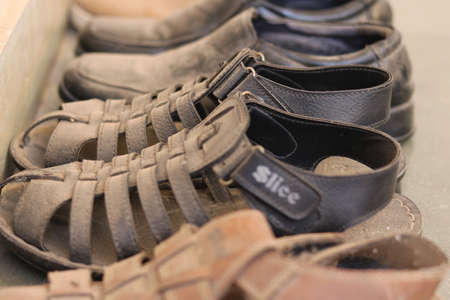 closeup view of shoes never use during lock down with dust on topの写真素材