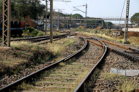 Railroad tracks and Switches near a train stationの写真素材