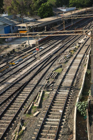 Railroad tracks and Switches near a train stationの写真素材