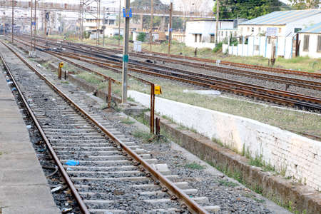 Railroad tracks and Switches near a train stationの写真素材