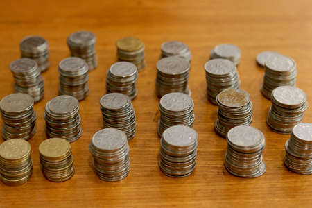 group of stack currency coins on table - Imageの写真素材