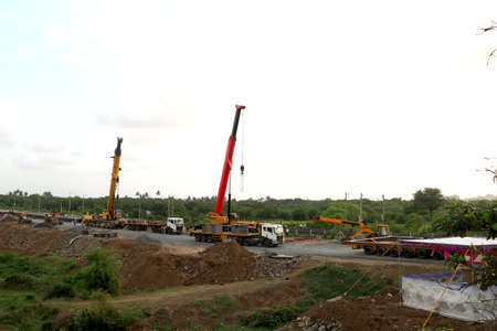 crane truck at construction site background of blue skyの写真素材
