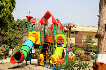 kids playground, entertainment in the form of horizontal bars and swings, recreation park, children's toysの写真素材