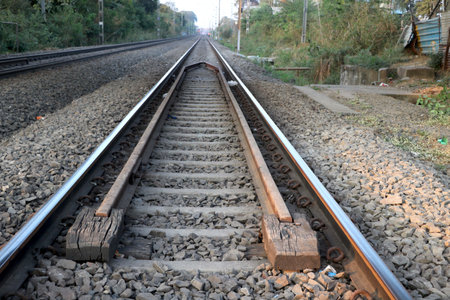 Empty straight single-way railways at summer sunny day.の写真素材