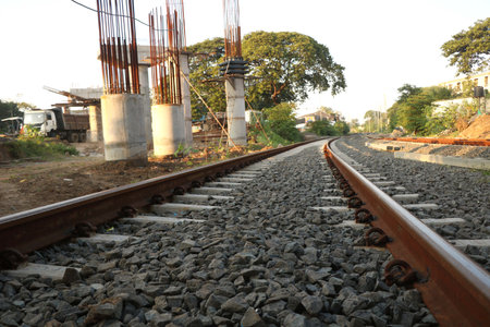 Empty straight single-way railways at summer sunny day.の写真素材