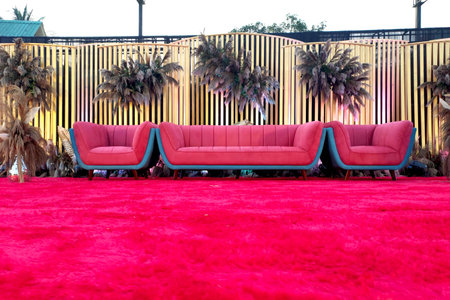India Wedding event stage decorated with flower, chair, lightの写真素材